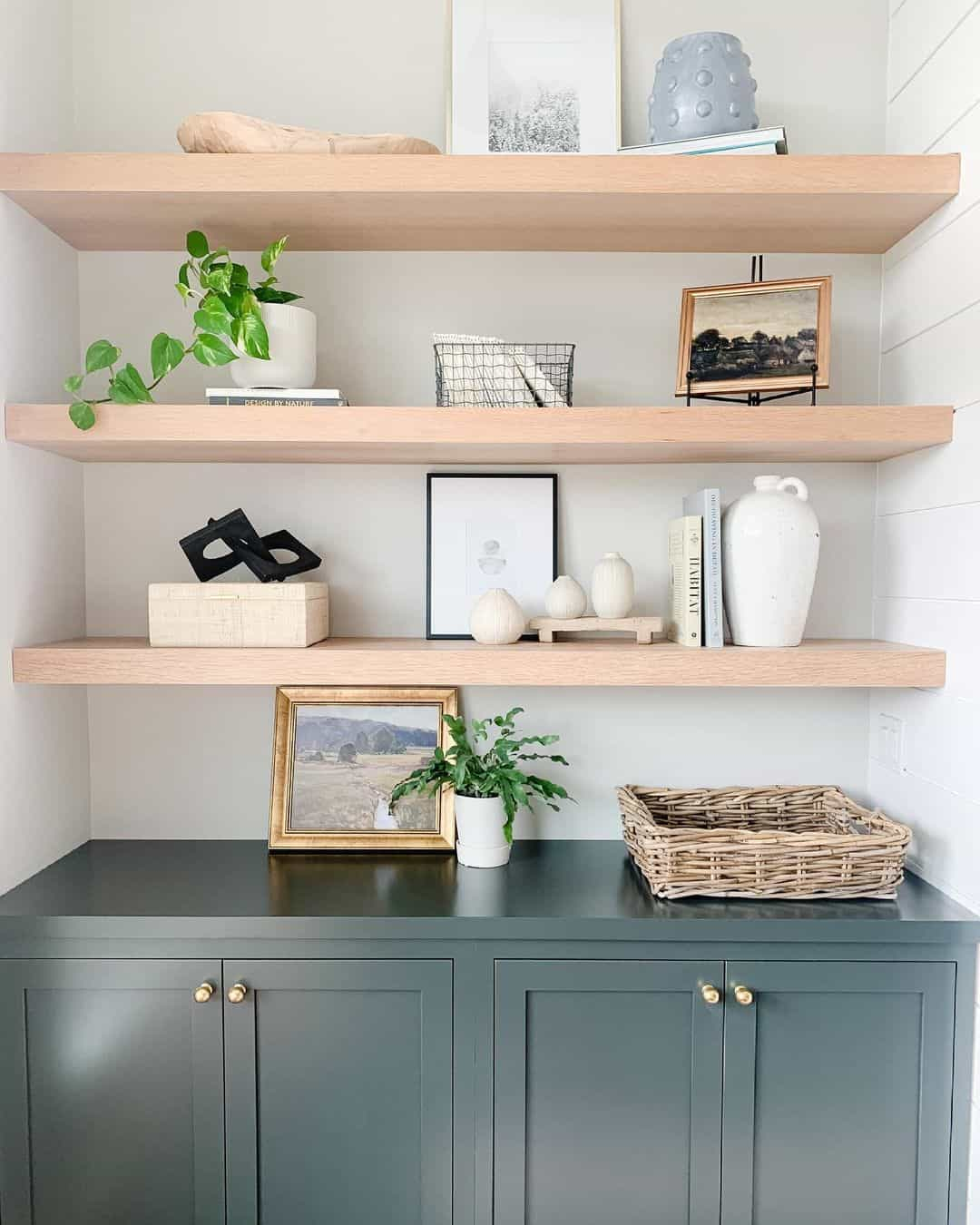 21 Incredible Long Floating Shelves Perfect For Any Space intended for Master the Rule of Three for Perfect Floating Shelf Arrangements