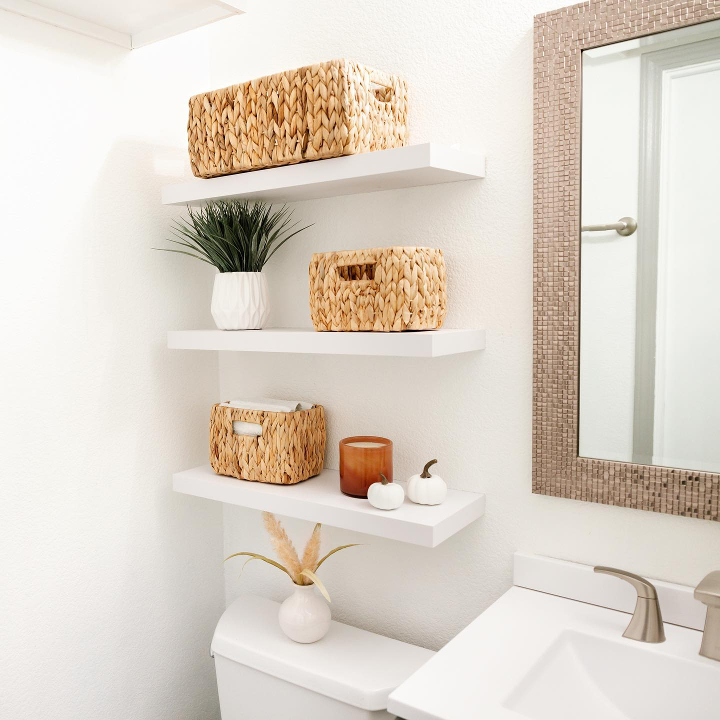30 Outstanding Floating Shelves Bathroom Ideas within Master the Rule of Three for Perfect Floating Shelf Arrangements