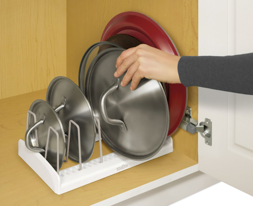 A Kitchen Organizing Challenge: Pot Lids - Core77 for How to finally tame the chaotic jumble of pot lids in your cabinets