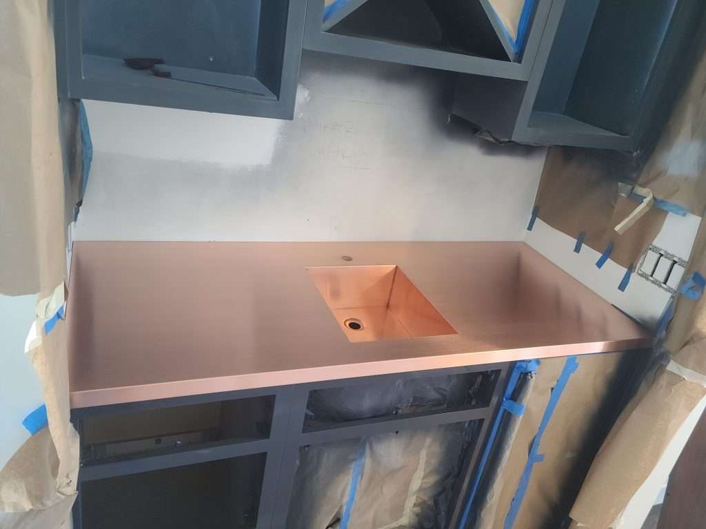 Custom Copper Sheet Kitchen Countertops & Bar Tops intended for What Homeowners Wish They Knew Before Installing Copper Countertops