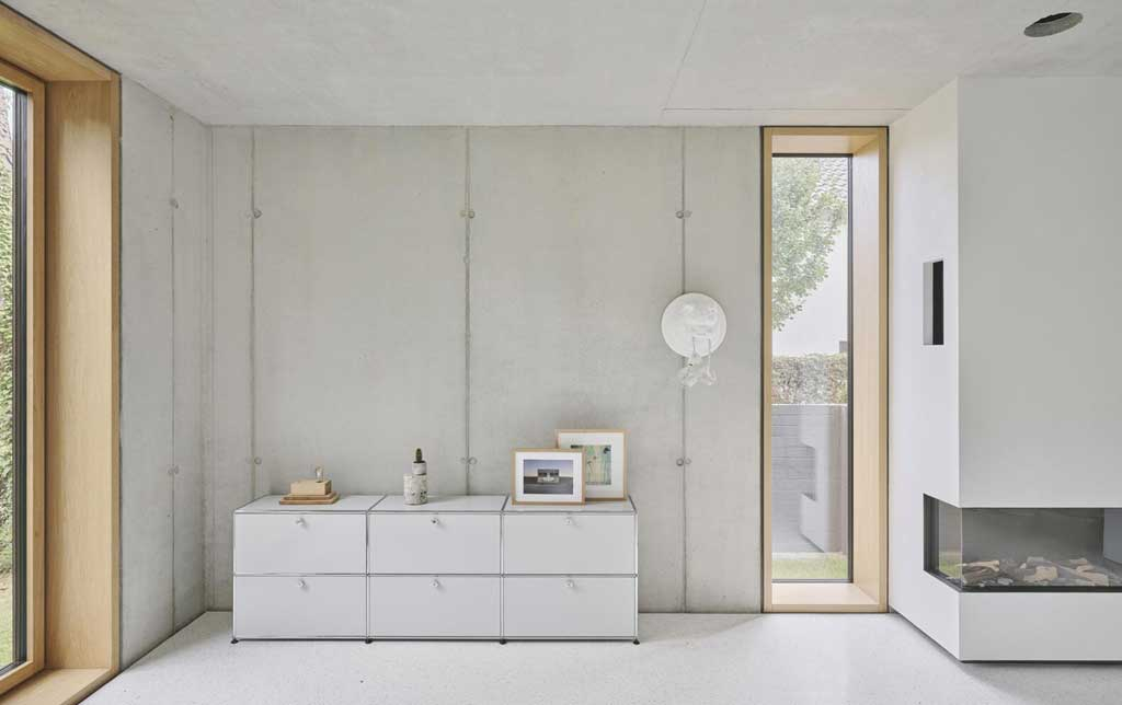 Exposed Concrete Walls With Sleek Interiors For A Bold Architectural ... in Exposed Concrete Wall Finish Interior