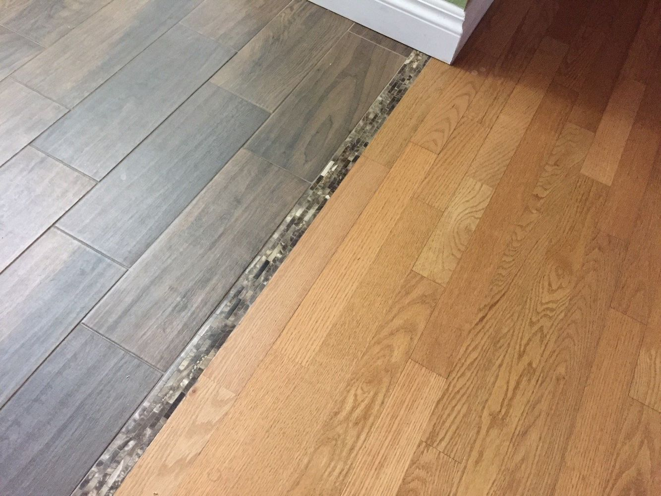 Hardwood Flooring Room Transitions – Flooring Tips regarding How to Choose the Perfect Transition Profile Between Hardwood and Ceramic