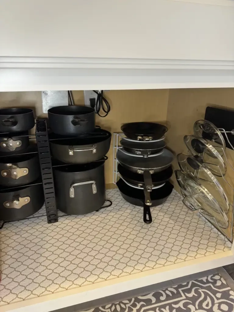 How To Organize Pots And Pans And Their Lids - An Organized Season ... regarding How to finally tame the chaotic jumble of pot lids in your cabinets