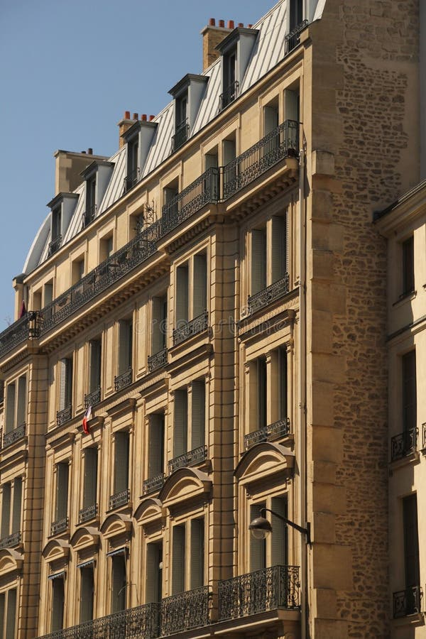 Parisian Building Facade Against Blue Sky. Editorial Photography ... intended for The Hidden Architectural Details That Define Authentic Parisian Style