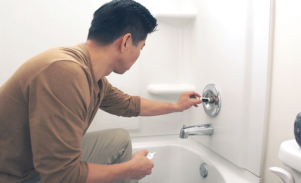 Stop The Drip: A Guide To Fixing Your Leaky Bathtub Faucet - New House ... within Replace Bathtub Spout