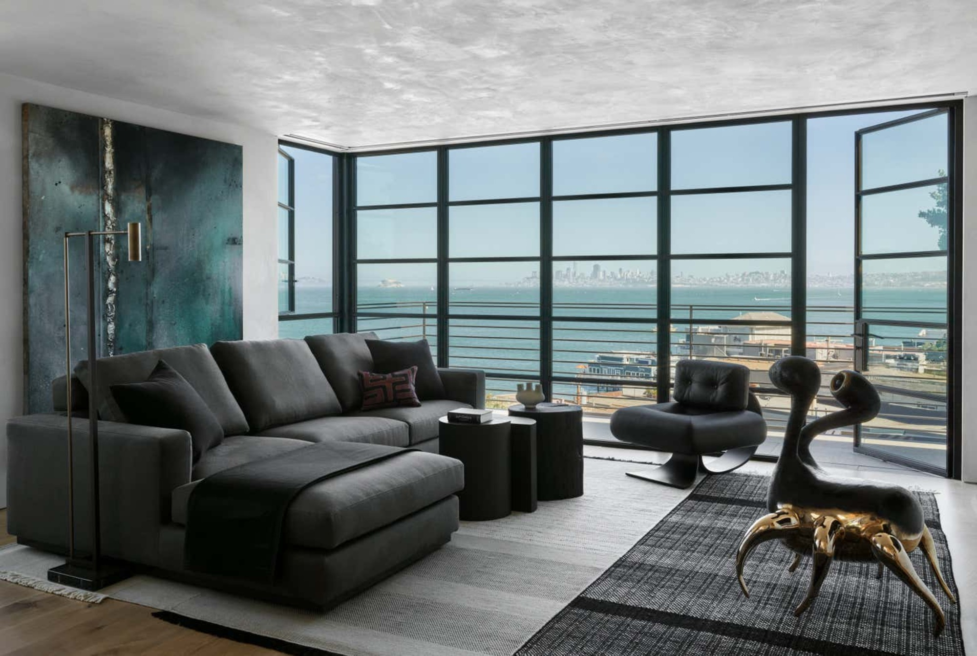 What Color Sofa Goes With A Grey Rug? These Combinations Make For The ... throughout Layering Rugs Living Room