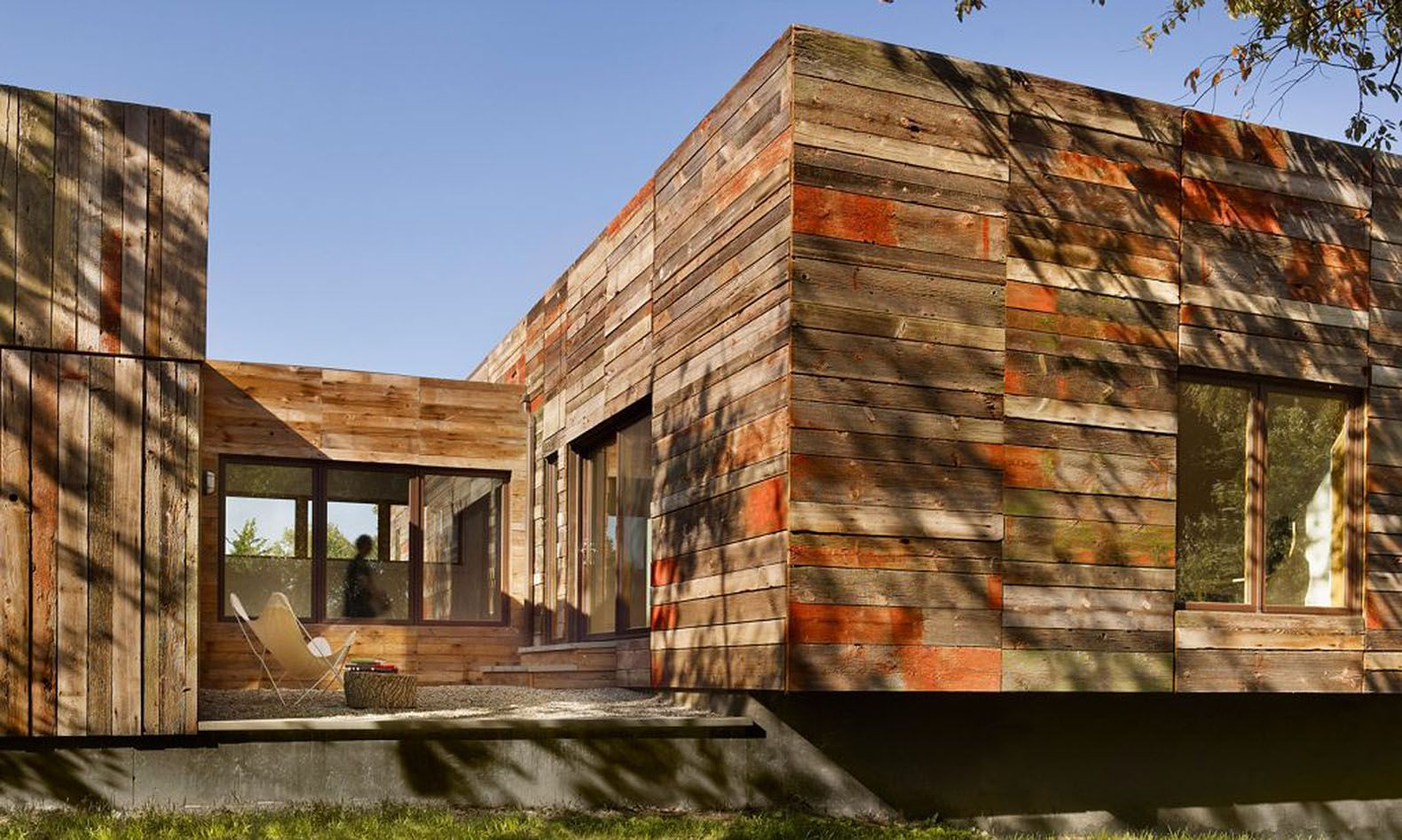 Vernacular-Inspired Delaware Home Built With Recycled Barn Wood ... with Rustic Interior Design