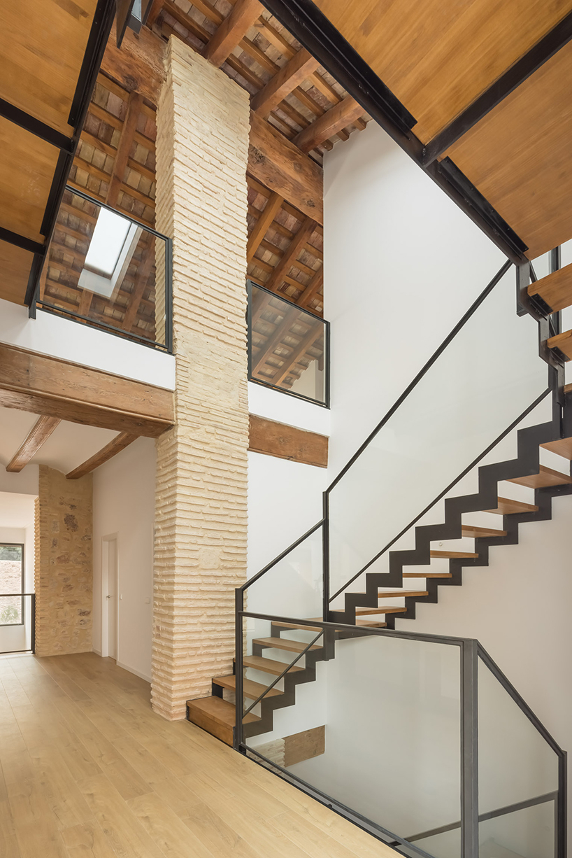 Jsj Arquitectos Revives Century-Old Stone Home In Spain with How a century old stone finishing technique reinvented modern architecture